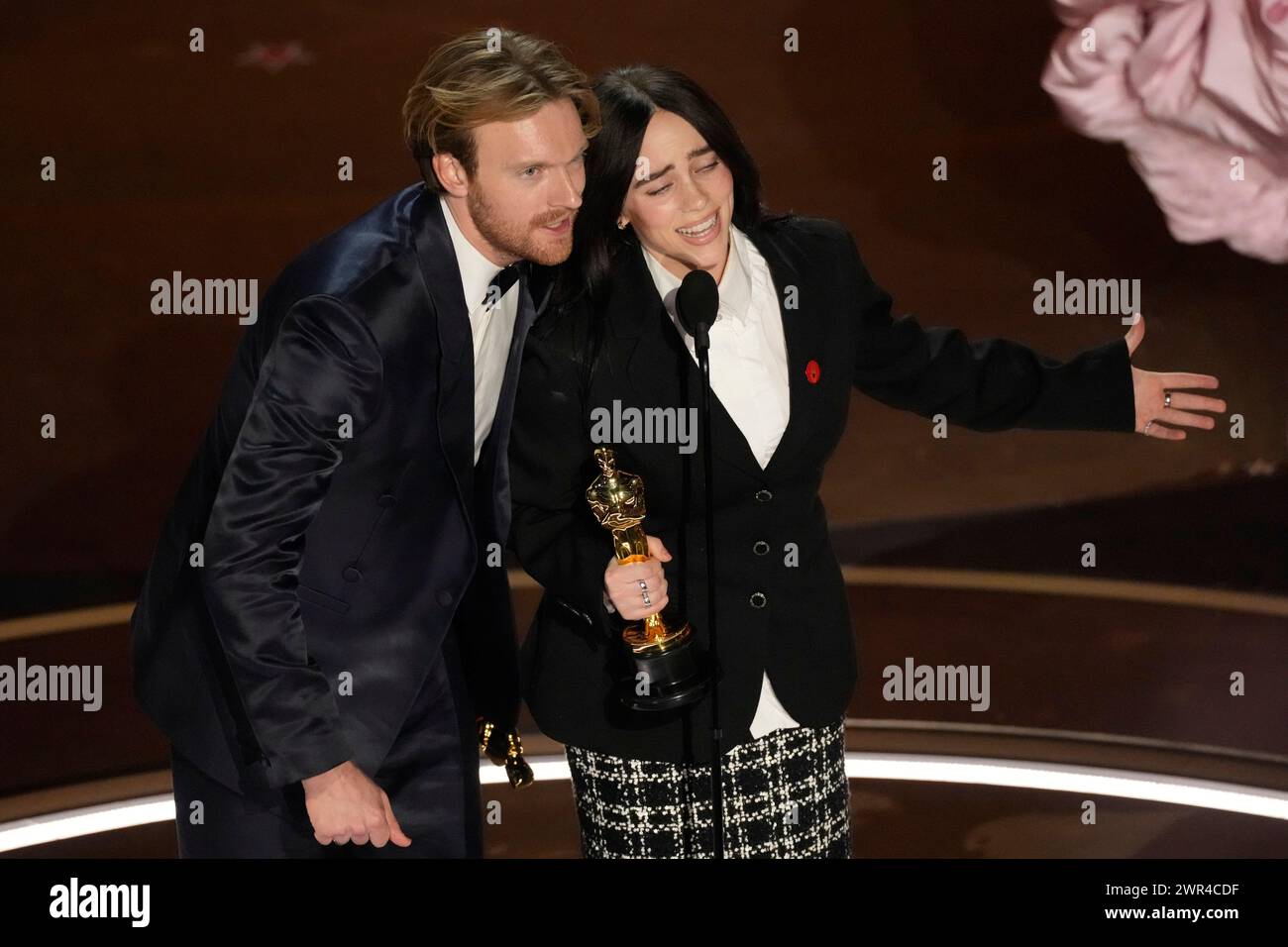 Finneas O'Connell, left, and Billie Eilish accept the award for best
