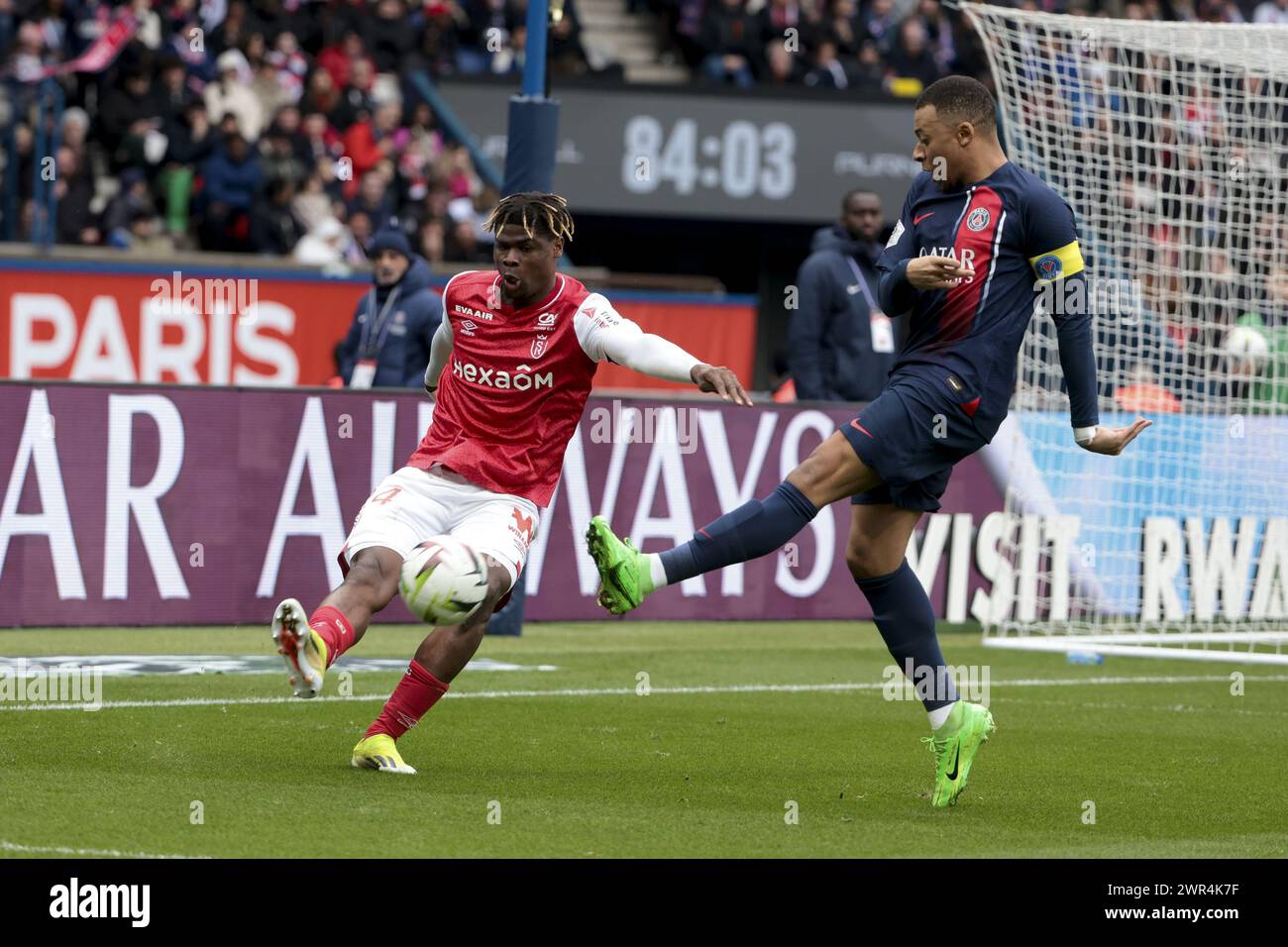 Emmanuel Agbadou of Reims, Kylian Mbappe of PSG during the French ...