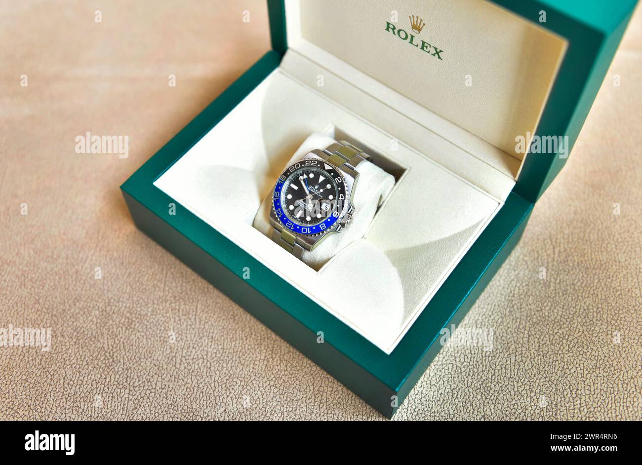 Bangkok Thailand- Feb 28,2022 :Open Rolex package green leather box of Rolex GMT-Master II 'Batman' with blue-black bezel Steel Ceramic Men's Wrist wa Stock Photo