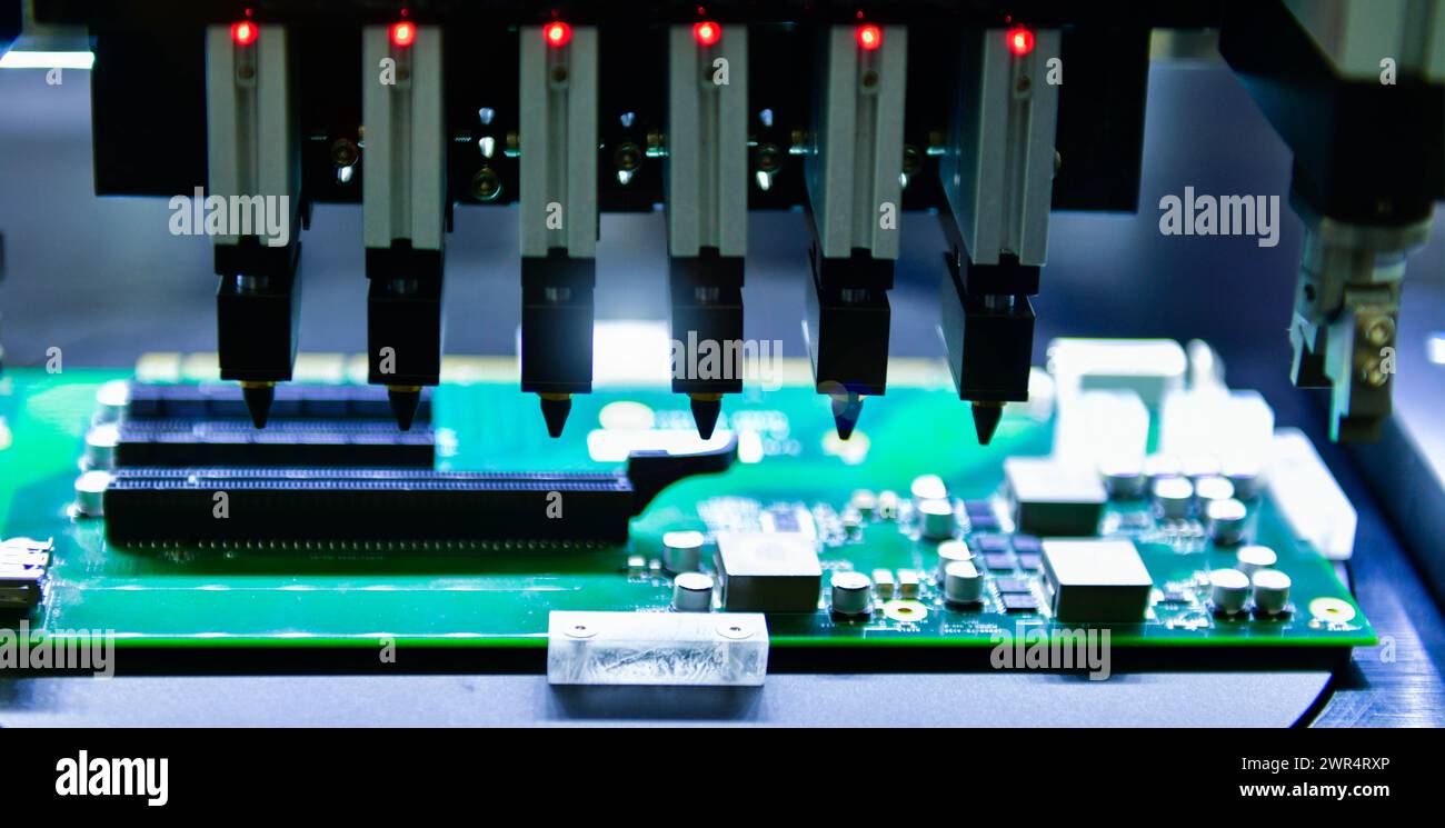 Electrical circuit board design steps Connector type solenoid valve Compressed air direction control system,Components in an automated production line Stock Photo