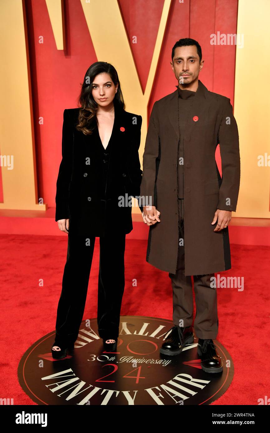Fatima Farheen Mirza, left, and Riz Ahmed arrive at the Vanity Fair ...
