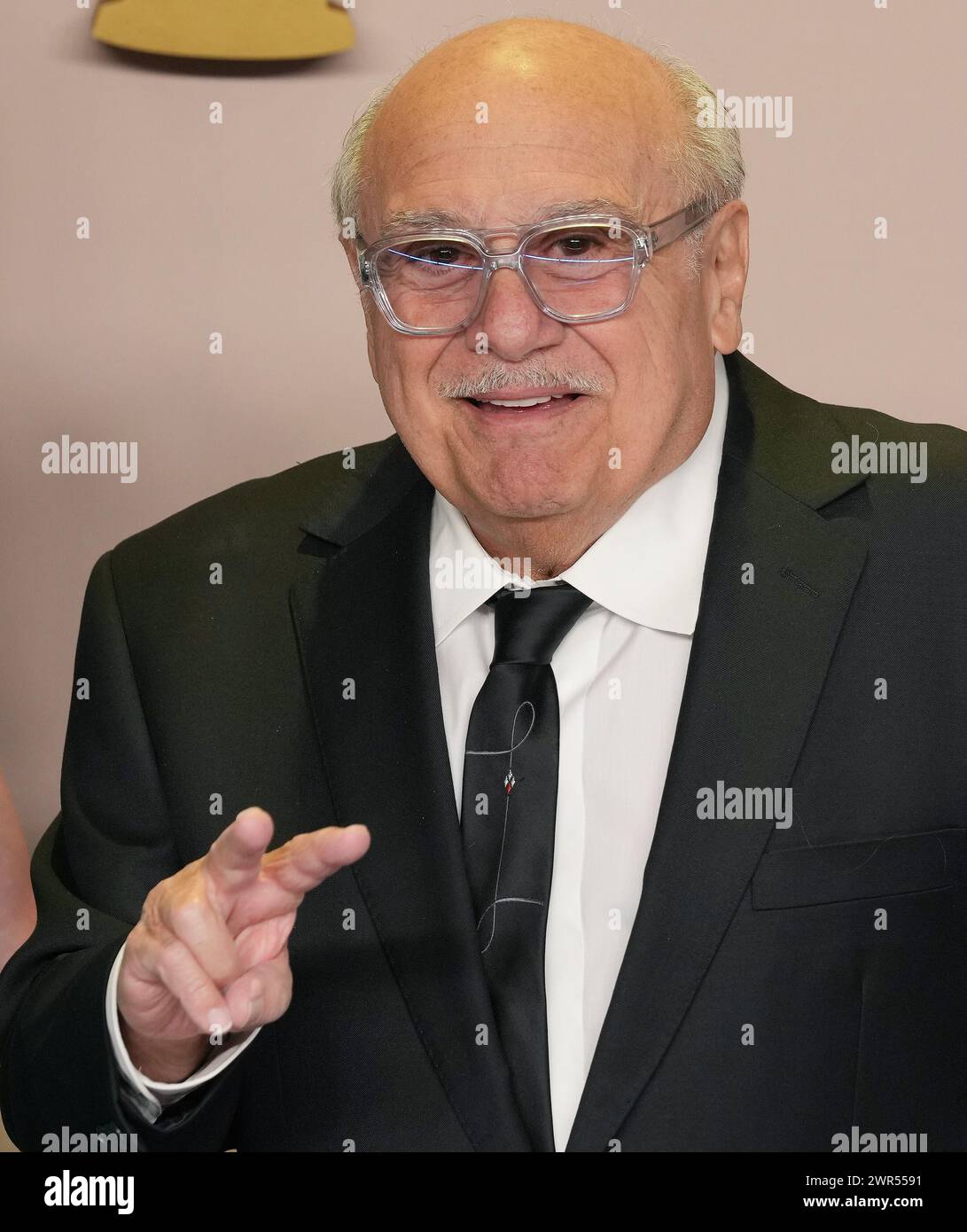 Los Angeles, USA. 10th Mar, 2024. Danny DeVito in the press room at the The 96th Academy Awards held by the Academy of Motion Picture Arts and Sciences at the Dolby Theatre in Los Angeles, CA on Sunday, March 10, 2024. (Photo by Sthanlee B. Mirador/Sipa USA) Credit: Sipa USA/Alamy Live News Stock Photo