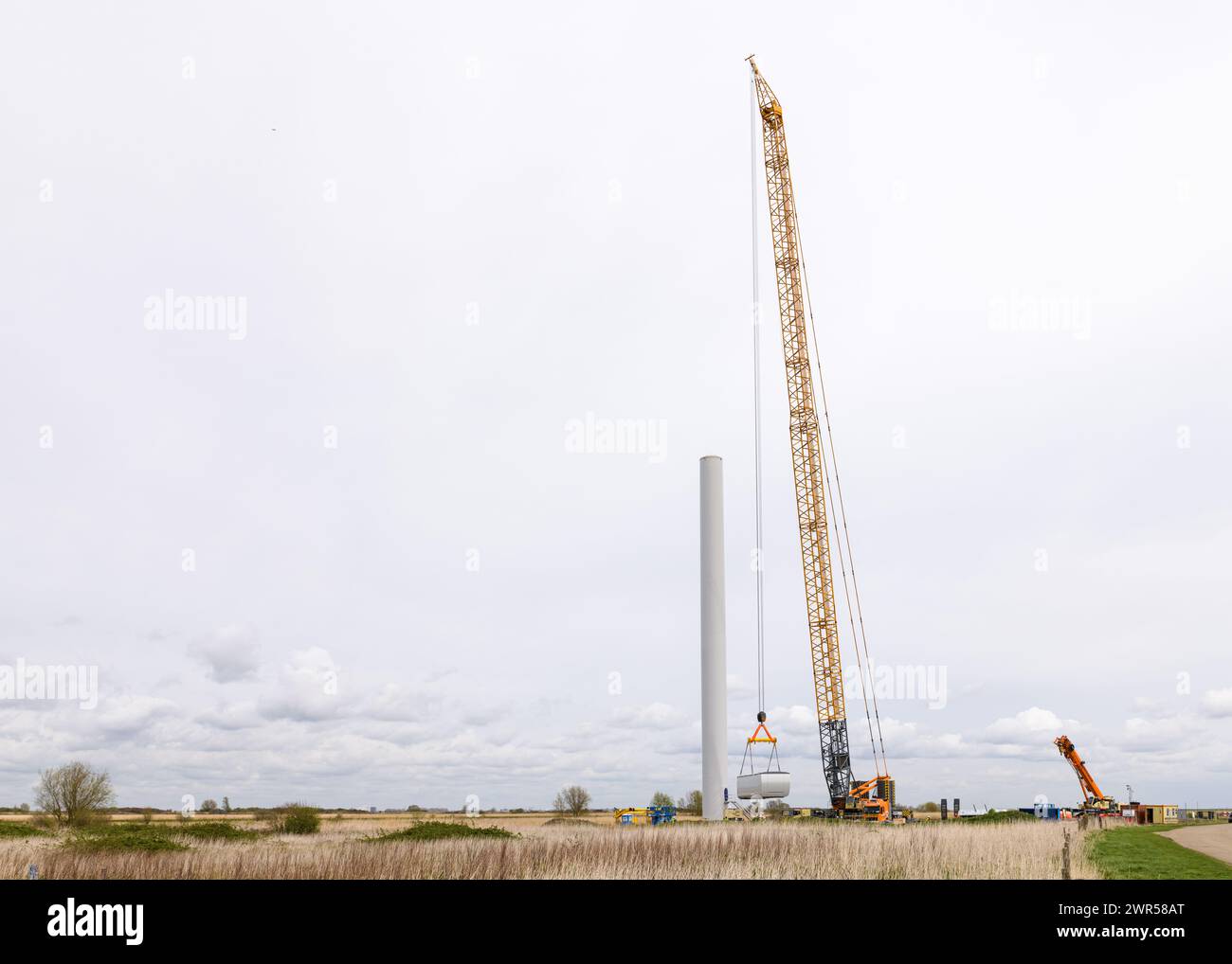 MELISSANT, GOEREE-OVERFLAKKEE, THE NETHERLANDS - APRIL 8, 2022: The construction of a wind turbine at the newly developed windpark Kroningswind near M Stock Photo