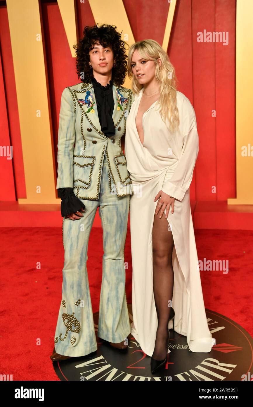 Towa Bird, left, and Renee Rapp arrive at the Vanity Fair Oscar Party ...