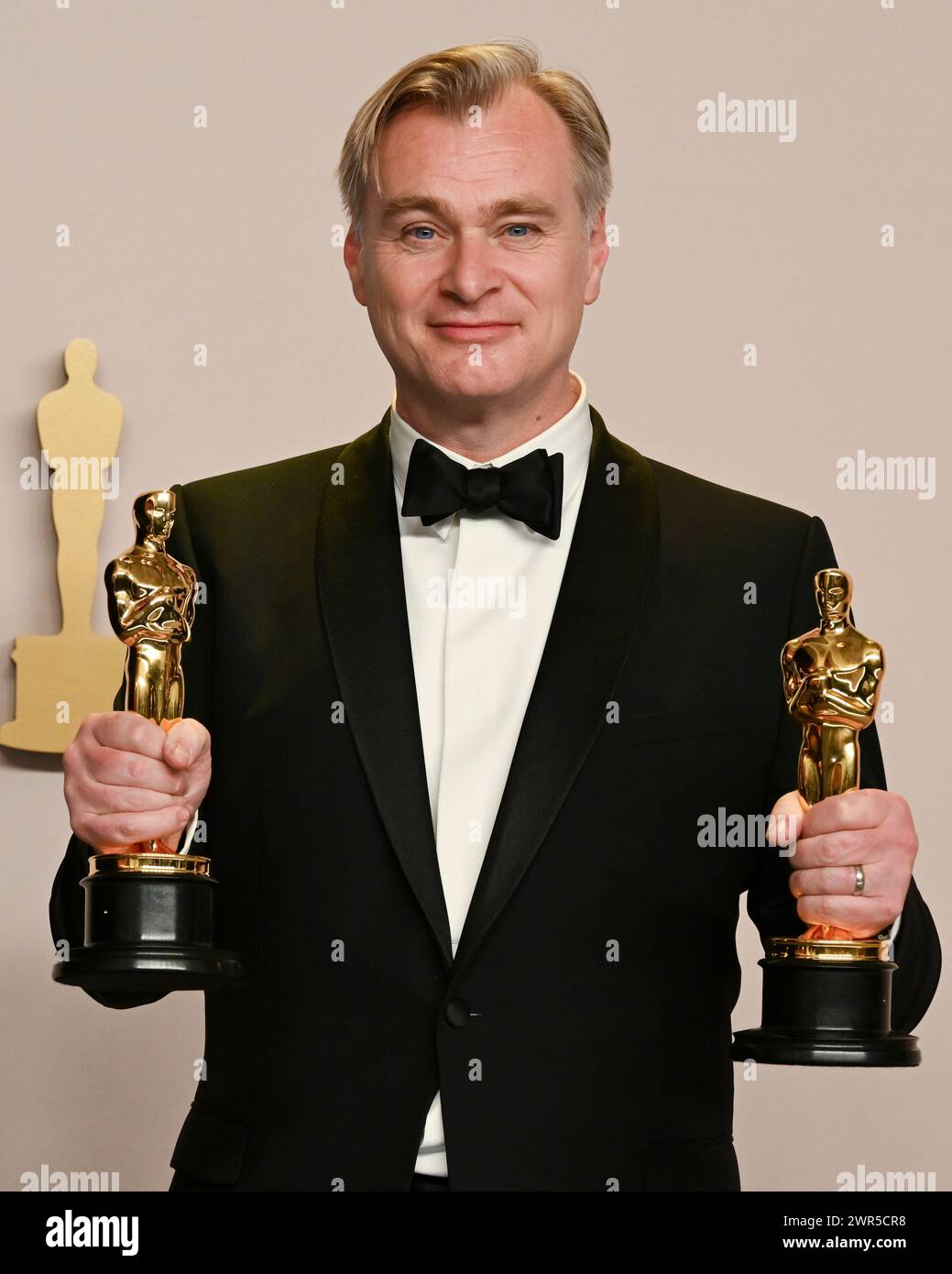 March 10, 2024, Hollywood, California, USA: CHRISTOPHER NOLAN won Best Director at the 2024 Oscars, for directing 'Oppenheimer' in the Press Room during the 96th Academy Awards, presented by the Academy of Motion Picture Arts and Sciences (AMPAS), at the Dolby Theatre in Hollywood. (Credit Image: © Billy Bennight/ZUMA Press Wire) EDITORIAL USAGE ONLY! Not for Commercial USAGE! Stock Photo