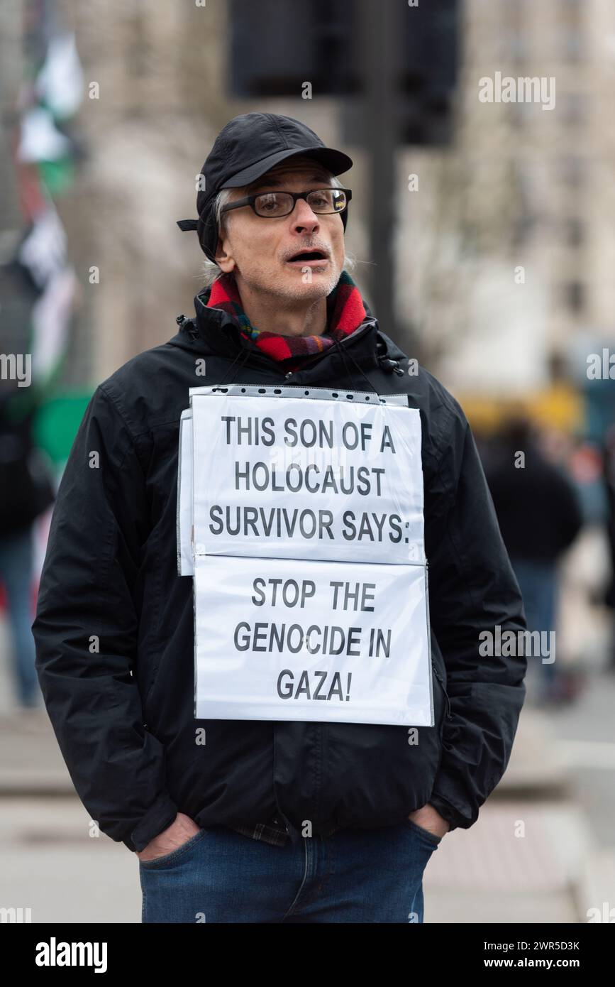 Son of Holocaust survivor sign at Pro Palestine protest march in London, UK, protesting against the conflict in Gaza and against Israel occupation Stock Photo
