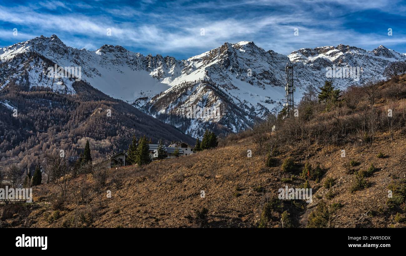 The snow-capped peaks of the Bermuda-Pierre Menu-Ambon mountain range on the border between France and Italy. the Group of the Wise Men. Italy Stock Photo