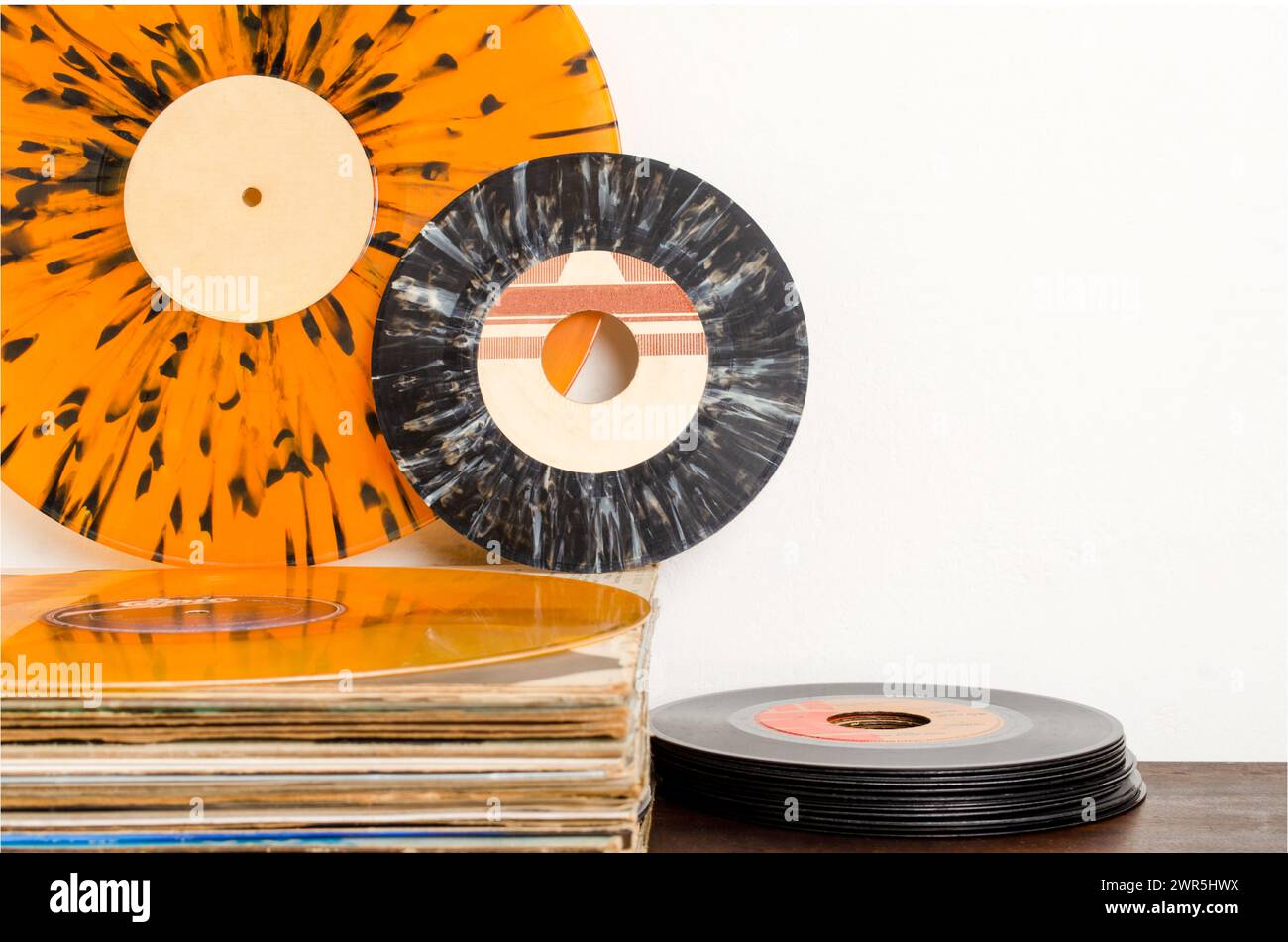 Close-up of vinyl records lying on the wall. Retro. Stock Photo