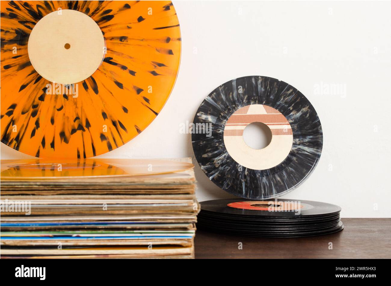 Close-up of vinyl disc lying on the wall. Retro Stock Photo