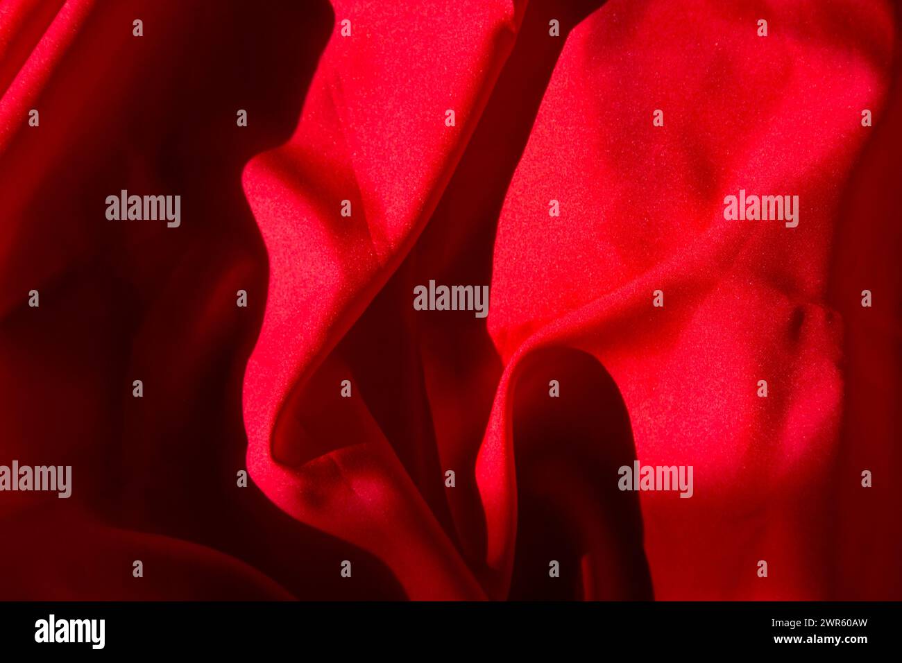 Heartfelt Textures - Soft Waves of Valentine Red Velvet Red sensual background. Stock Photo