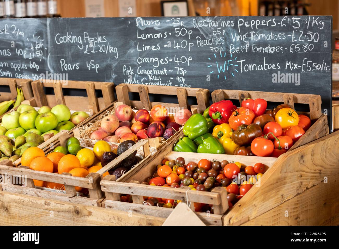 Fresh fruit and vegetables on display in a shop Stock Photo - Alamy