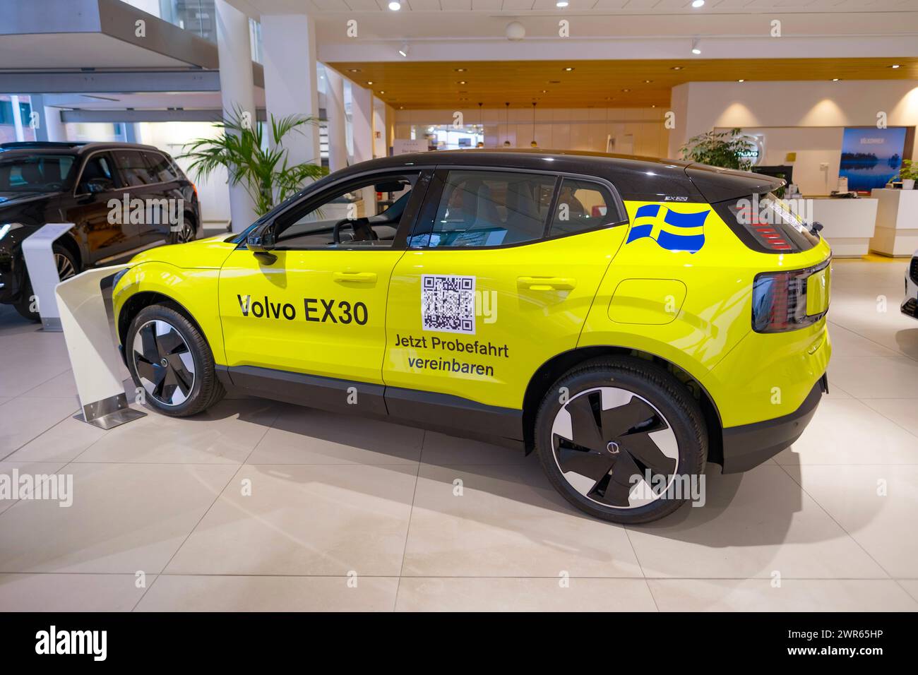 lemon green Volvo EX30 electric SUV produced Swedish automaker Volvo