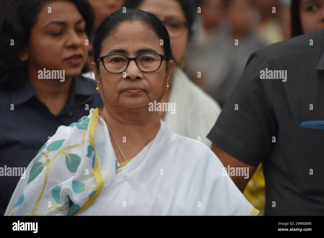 Kolkata, West Bengal, India. 7th Mar, 2024. West Bengal Chief Minister and Trinamool Supremo Mamata Banerjee led a women's rally in Kolkata today, responding to Prime Minister Narendra Modi's criticism of the Trinamool Congress over the Sandeshkhali issue. Women from Sandeshkhali island, where allegations against local Trinamool leaders have emerged, also joined. The rally, themed ''Mahilader Adhikar, Amader Angikar'' (women's rights, our commitment), featured Banerjee leading a foot march, accompanied by prominent Trinamool leaders like Sushmita Dev, Shashi Panja, and Rajya Sabha MP Sagarika Stock Photo