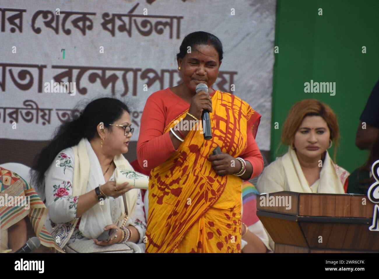 Kolkata, West Bengal, India. 7th Mar, 2024. A Sandeskhali woman talking at the West Bengal Chief Minister and Trinamool Supremo Mamata Banerjee led a women's rally in Kolkata today, responding to Prime Minister Narendra Modi's criticism of the Trinamool Congress over the Sandeshkhali issue. Women from Sandeshkhali island, where allegations against local Trinamool leaders have emerged, also joined. The rally, themed ''Mahilader Adhikar, Amader Angikar'' (women's rights, our commitment), featured Banerjee leading a foot march, accompanied by prominent Trinamool leaders like Sushmita Dev, Shashi Stock Photo