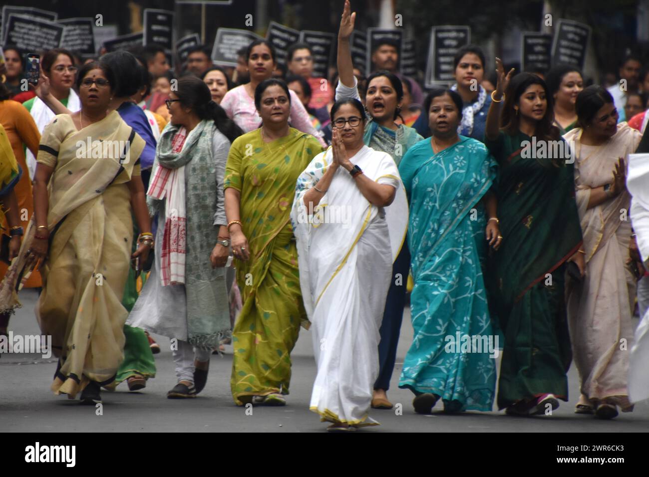 Kolkata, West Bengal, India. 7th Mar, 2024. West Bengal Chief Minister and Trinamool Supremo Mamata Banerjee led a women's rally in Kolkata today, responding to Prime Minister Narendra Modi's criticism of the Trinamool Congress over the Sandeshkhali issue. Women from Sandeshkhali island, where allegations against local Trinamool leaders have emerged, also joined. The rally, themed ''Mahilader Adhikar, Amader Angikar'' (women's rights, our commitment), featured Banerjee leading a foot march, accompanied by prominent Trinamool leaders like Sushmita Dev, Shashi Panja, and Rajya Sabha MP Sagarika Stock Photo