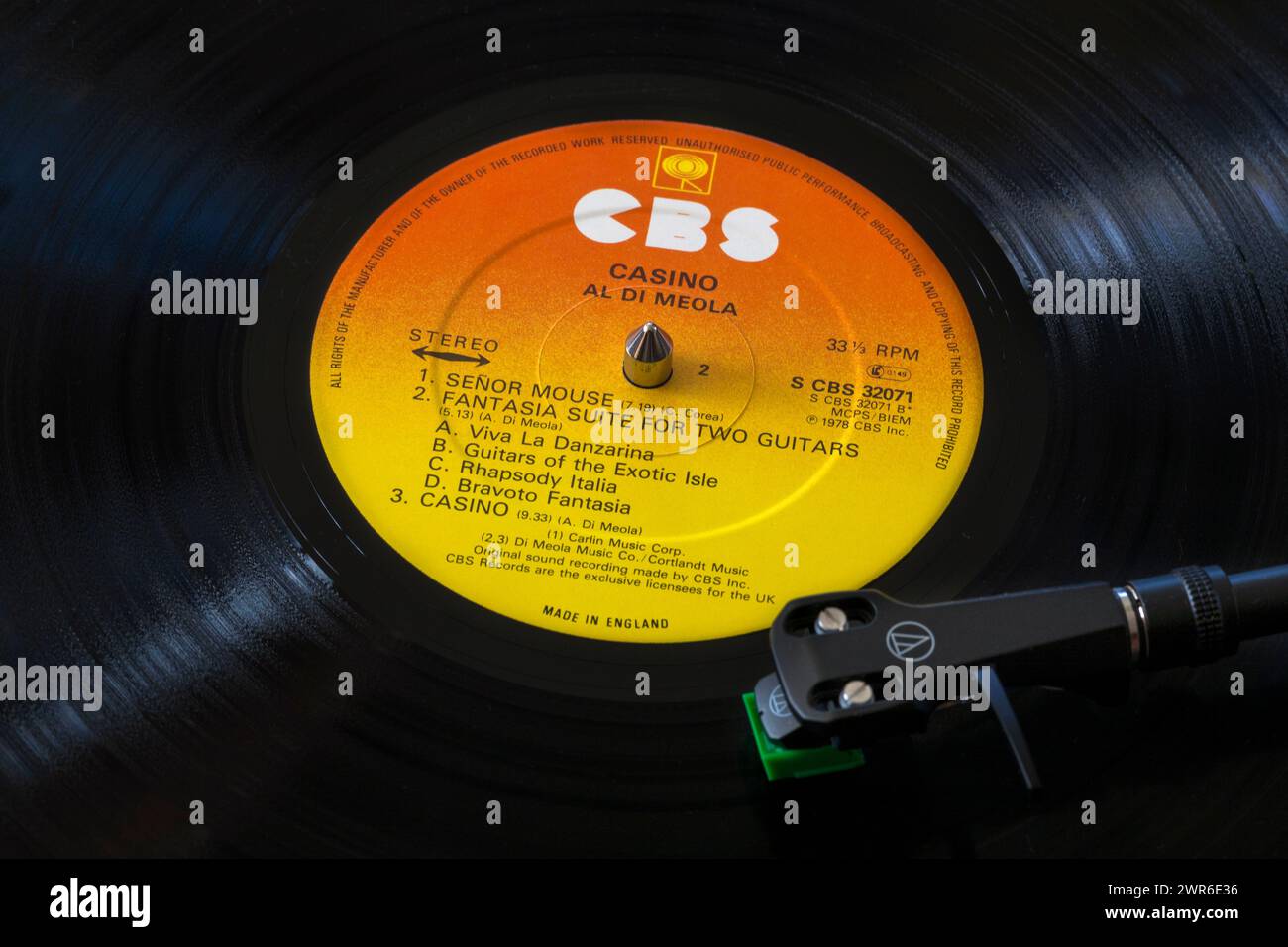 Al Di Meola Casino vinyl record album LP with tonearm, cartridge, headshell and stylus on turntable record player  - 1978 Stock Photo