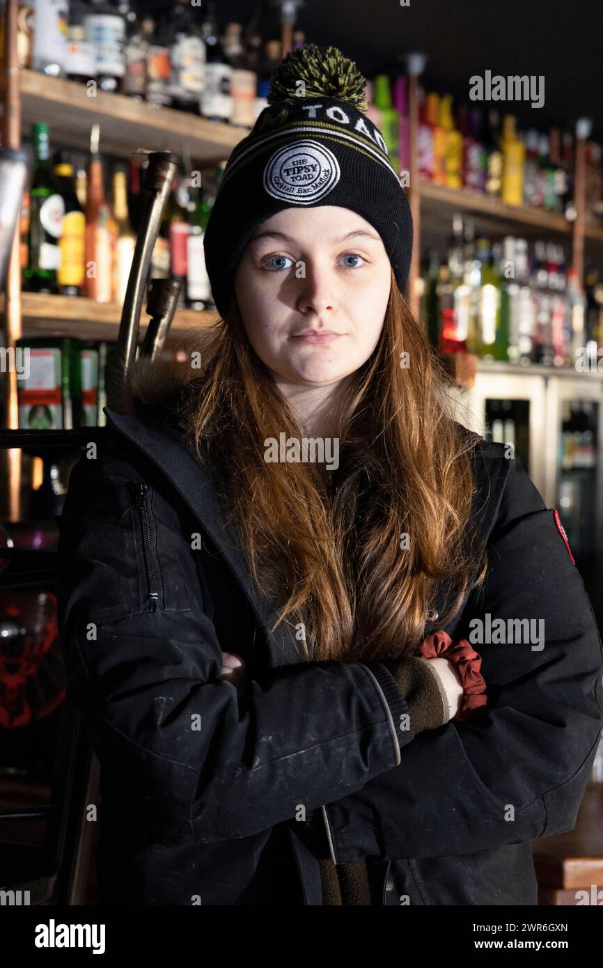 21/02/22   Commissioned photo for Janet Tomlinson  Bar Manager, Julia Neale, 23, at the Tipsy Toad after flooding today.  Matlock post-flood clean-up. Stock Photo