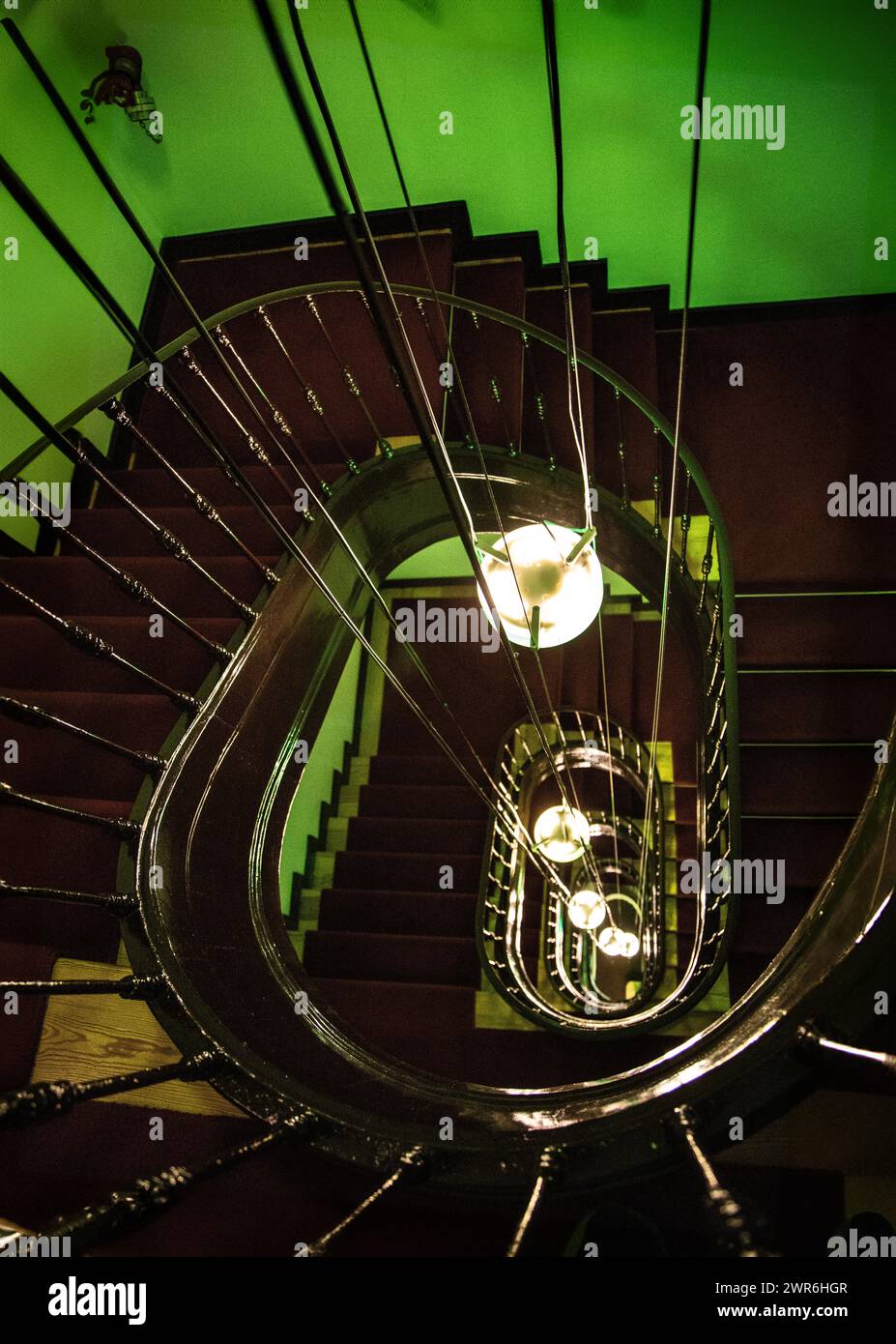 A photograph captures the allure of an ancient spiral staircase, its intricate design inviting exploration and evoking a sense of timeless elegance Stock Photo