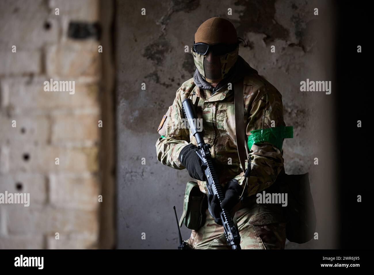 Ukrainian soldier wearing modern training ammunition on a firing range ...