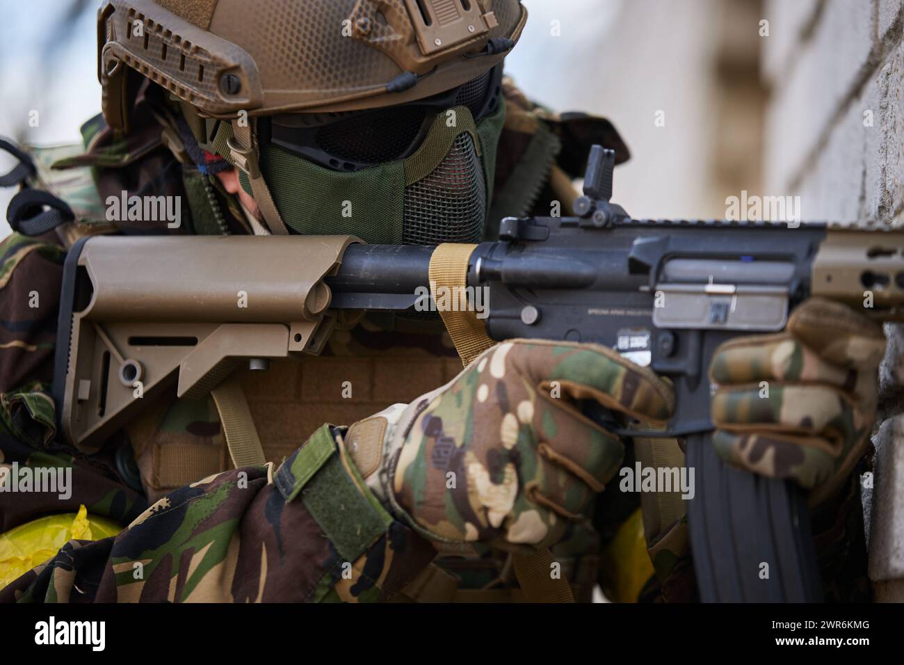Ukrainian soldier armed with carbine rifle training on a firing range ...
