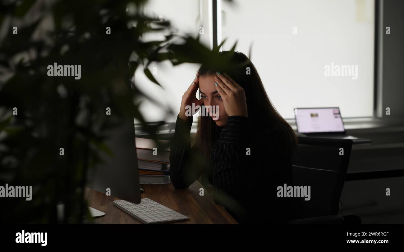 Woman computer head in hands hi-res stock photography and images - Alamy