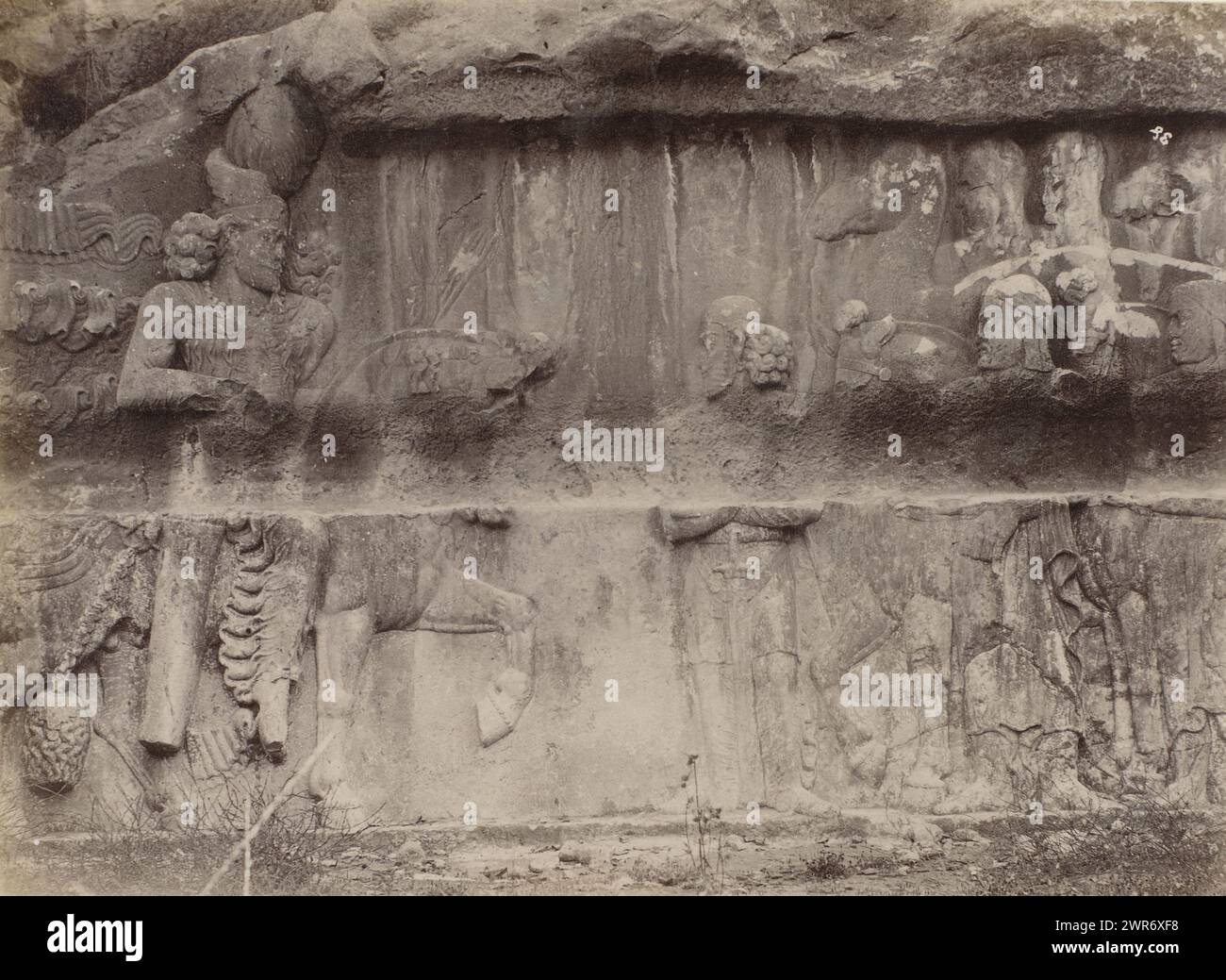 Relief IV in Bishapur, depicting the Sassanid king Bahram II and an Arab legation, Part of H. Dunlop's Travel Album with photographs of sights in Persia, Scotland, Germany, Russia, China and Canada., Antoine Sevruguin, Bishapur, c. 1880 - c. 1895, paper, albumen print, height 168 mm × width 224 mm, photograph Stock Photo