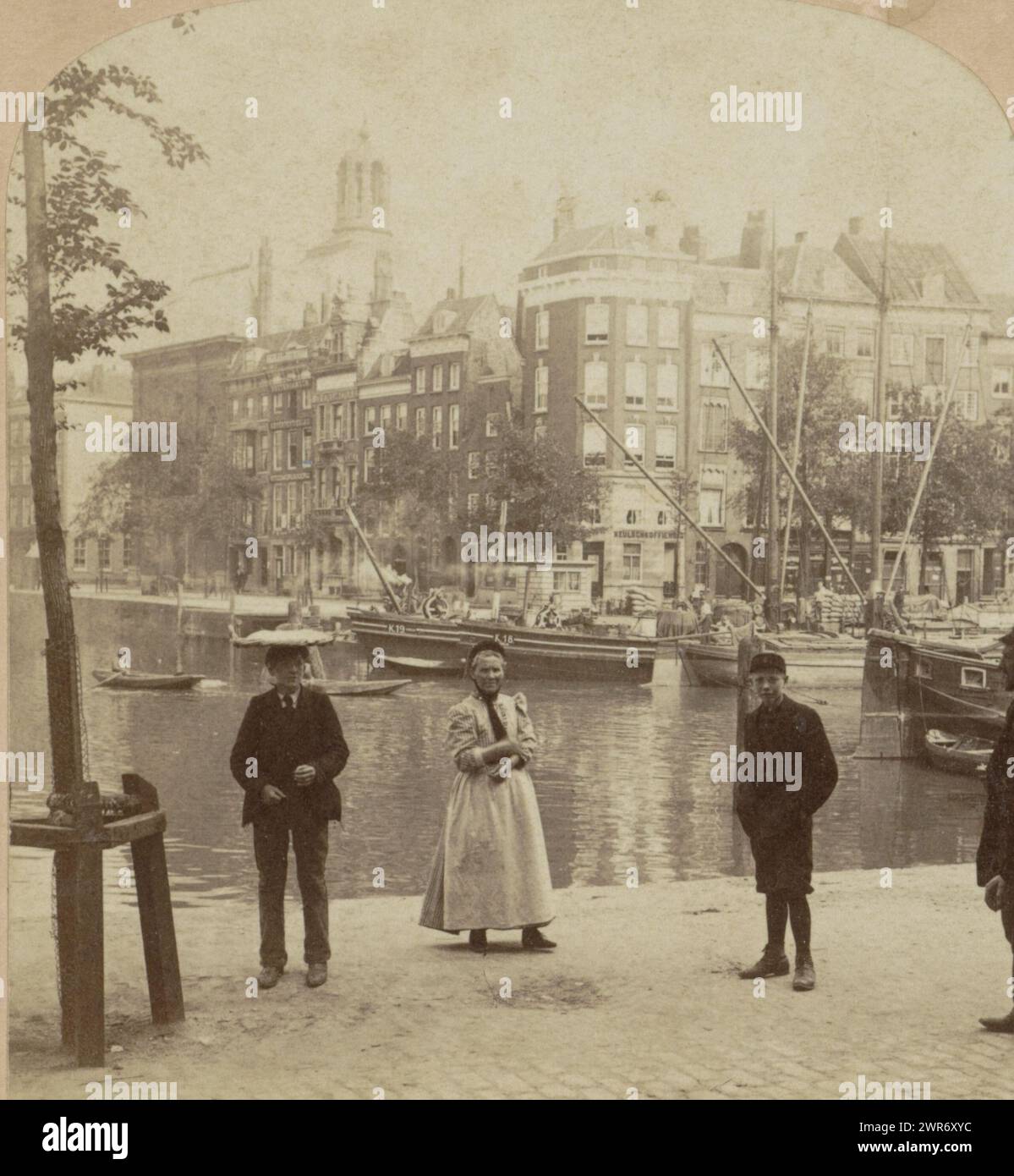 View of the Blaak in Rotterdam with the Lutheran church in the background, seen from the Schiedamsedijk, Holland. Rotterdam. Across the Canal (title on object), anonymous, publisher: William Herman Rau, Rotterdam, publisher: Philadelphia, 1896 - 1910, cardboard, albumen print, height 89 mm × width 177 mm, stereograph Stock Photo