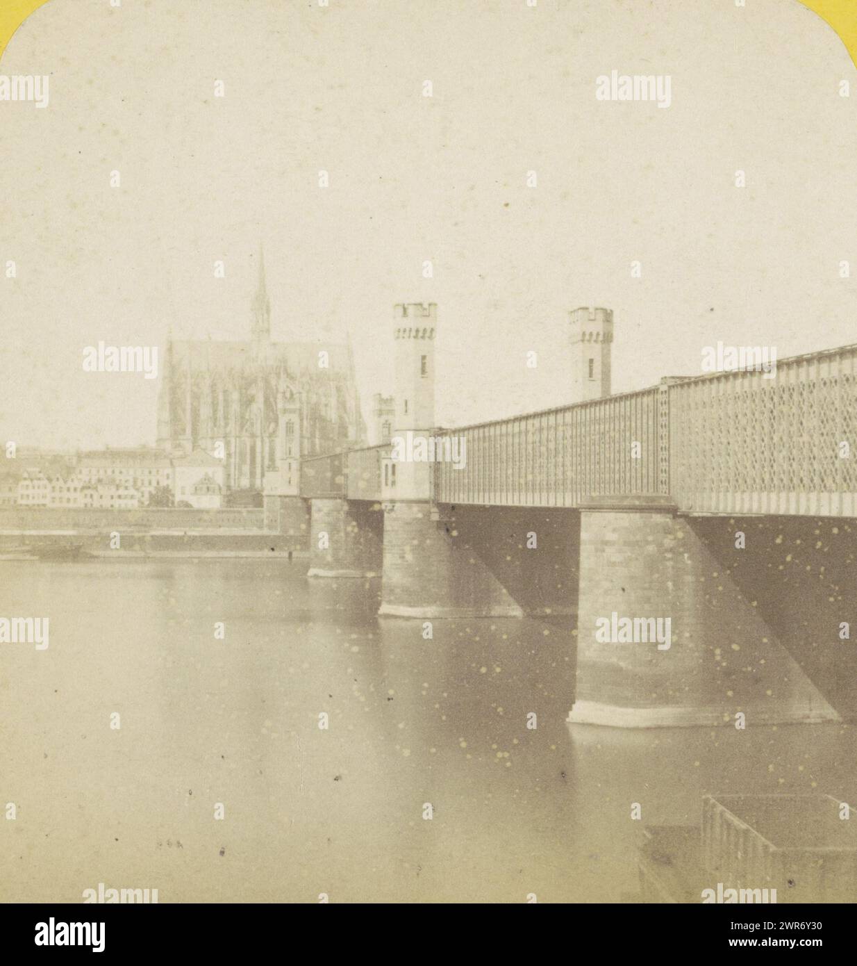 Dombrücke over the Rhine and Cologne Cathedral, Germany, Pont fixe et Cathédrale (title on object), Cologne (Prusse) (series title on object), Allemagne (series title on object), Hippolyte Jouvin, Cologne, 1864, cardboard, albumen print, height 86 mm × width 177 mm, stereograph Stock Photo