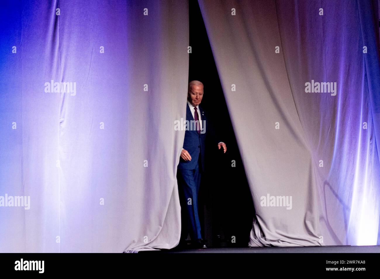 President Joe Biden arrives to speak at the National League of Cities ...