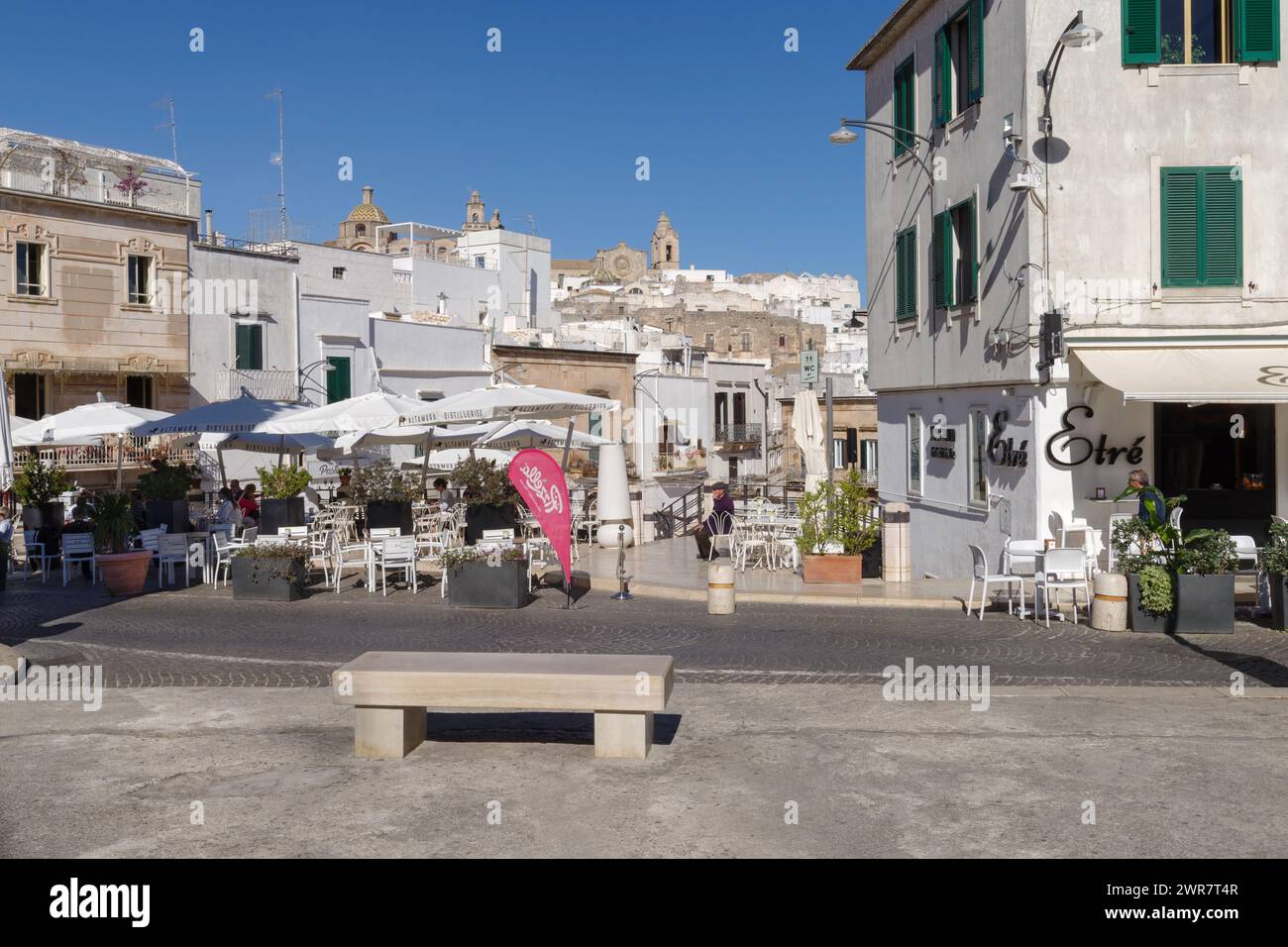 Street in the old town of Ostuni, also La Citta Bianca, The White Town, Itria Valley, Apulia region, Italy Stock Photo