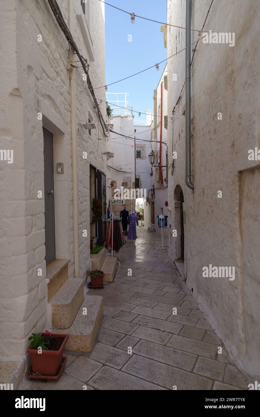 Narrow street in Ostuni old town, Apulia region, Italy Stock Photo