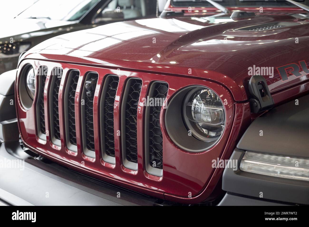Russia, Izhevsk - March 4, 2022: Jeep showroom. Bumper of a new off-road. Wrangler Unlimited. Elegant round headlamps. Off-road vehicles. Stock Photo