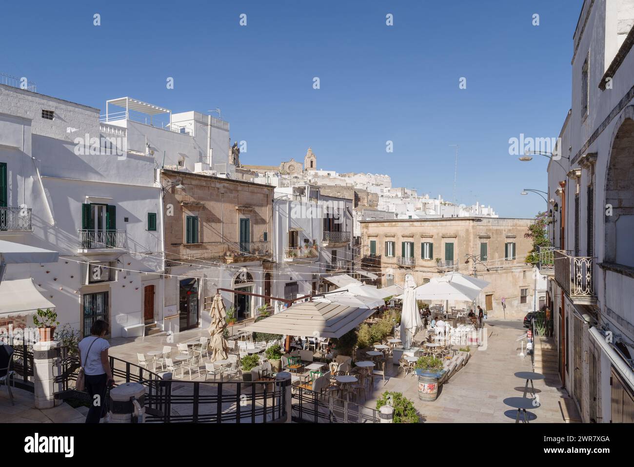 Street in the old town of Ostuni, also La Citta Bianca, The White Town, Itria Valley, Apulia region, Italy Stock Photo