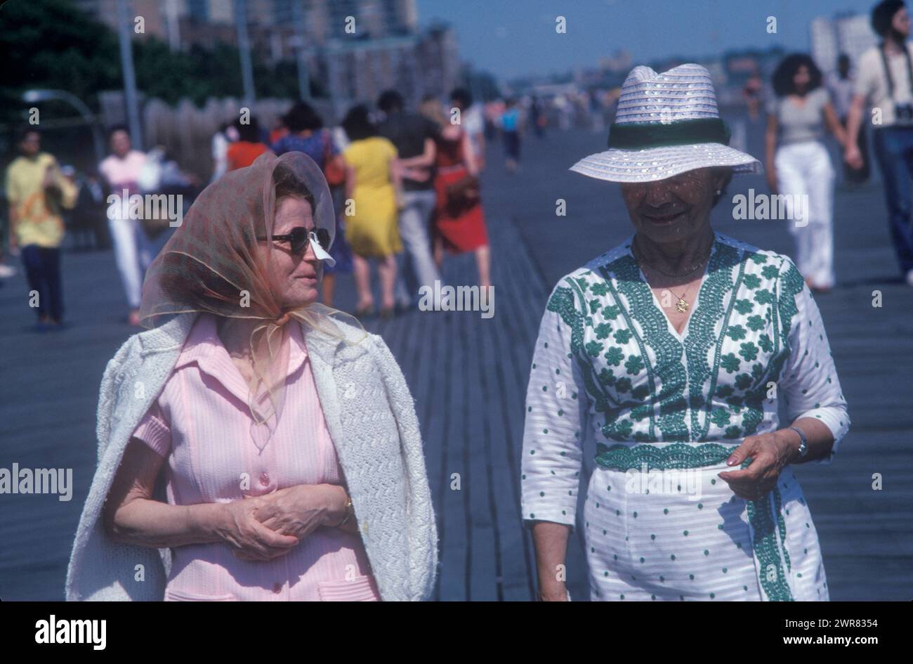 Retro 1980s Nose Sun Shield. Two women on vacation one wears a popular fashionable sunshield for her nose attached to her sunglasses.  1980s Coney Island  Brooklyn, New York City US 27th June 1981 USA HOMER SYKES Stock Photo