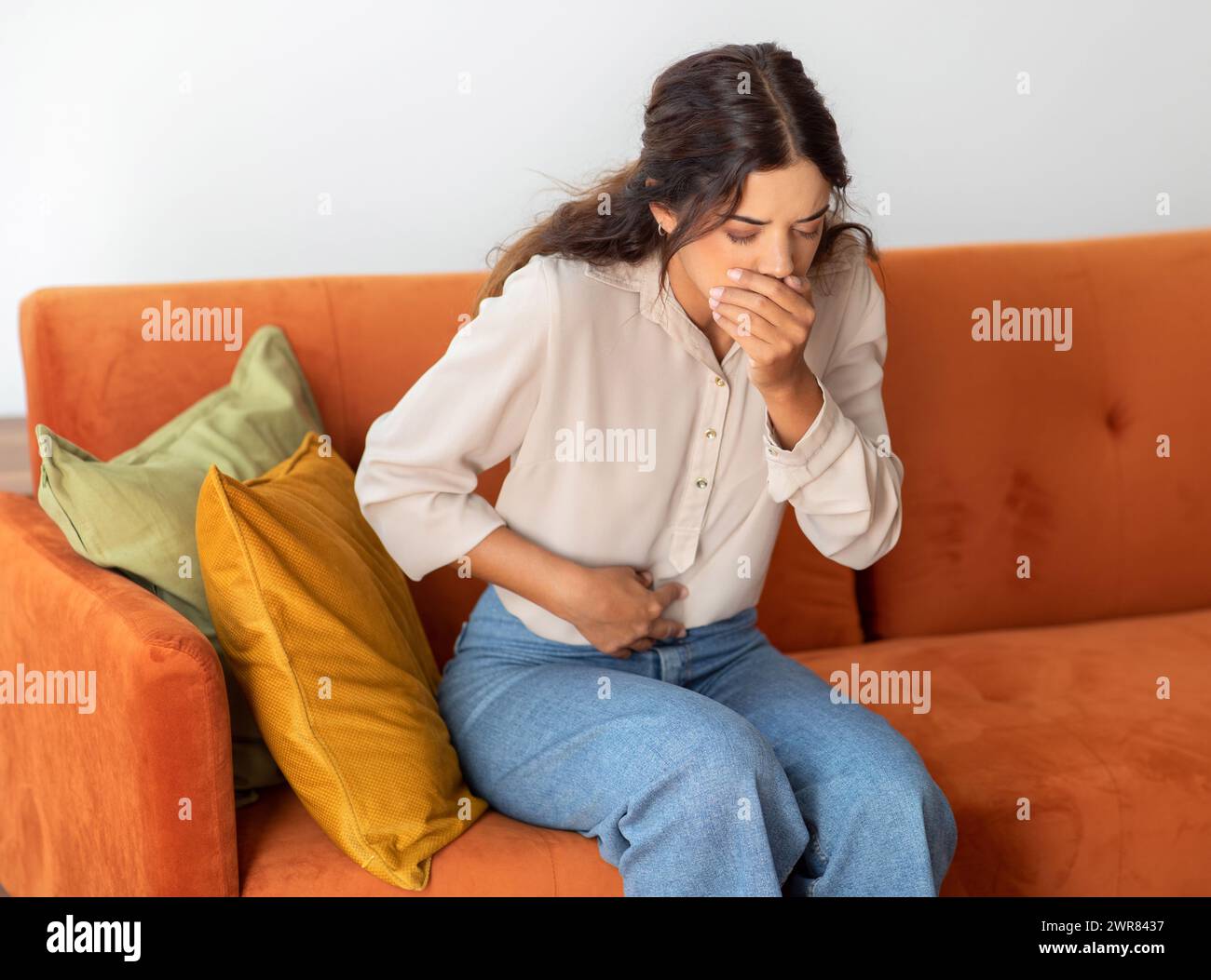 Woman stomach pain from hi-res stock photography and images - Alamy