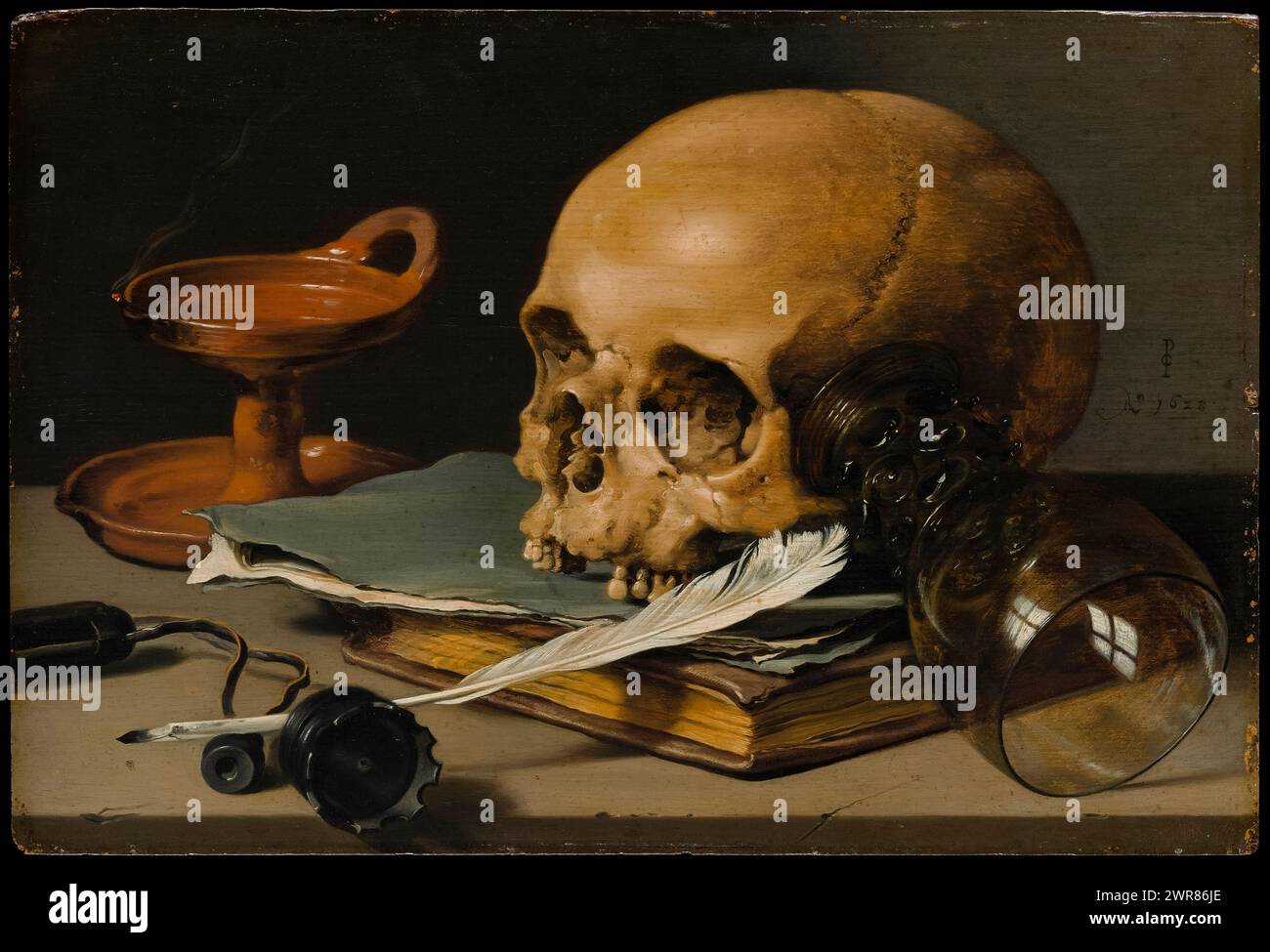 Still Life with a Skull and a Writing Quill by Dutch artist Pieter Claesz (c.1596-1660) painted in 1628. A selection of objects symbolising mortality with expert composition and rendering of light, shadow and texture. Oil on wood. Credit: The Metropolitan Museum of Art / Universal Art Archive Stock Photo
