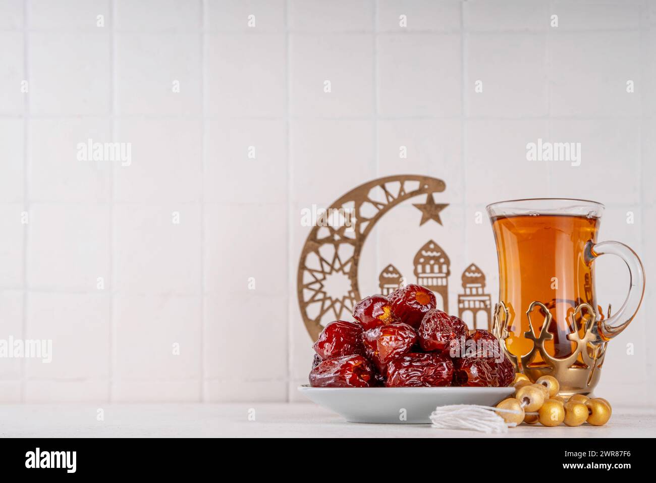 Ramadan Kareem background, Dates fruit, tea and rosary beads. Flat lay ...