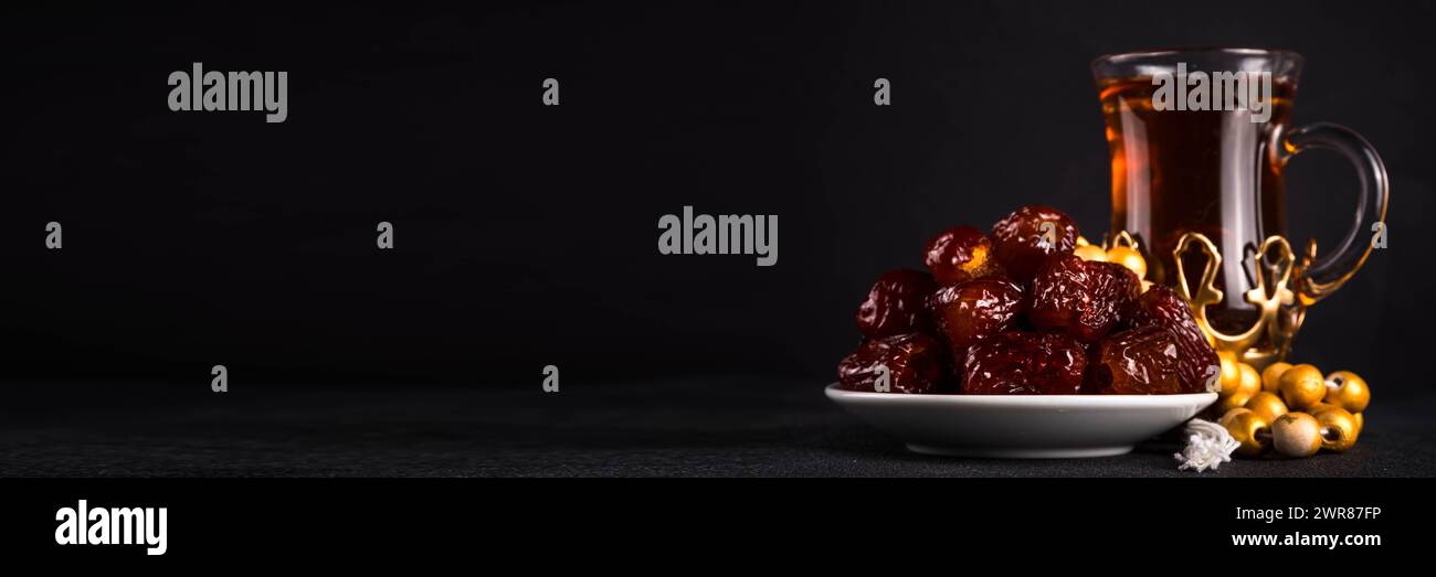 Ramadan Kareem background, Dates fruit, tea and rosary beads. Flat lay ...