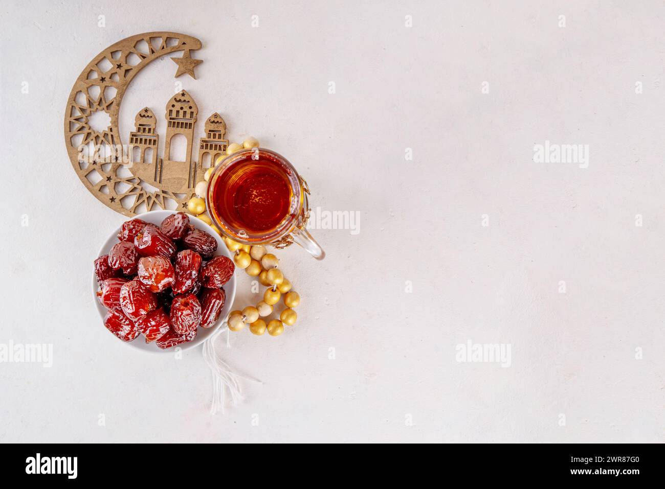 Ramadan Kareem background, Dates fruit, tea and rosary beads. Flat lay ...