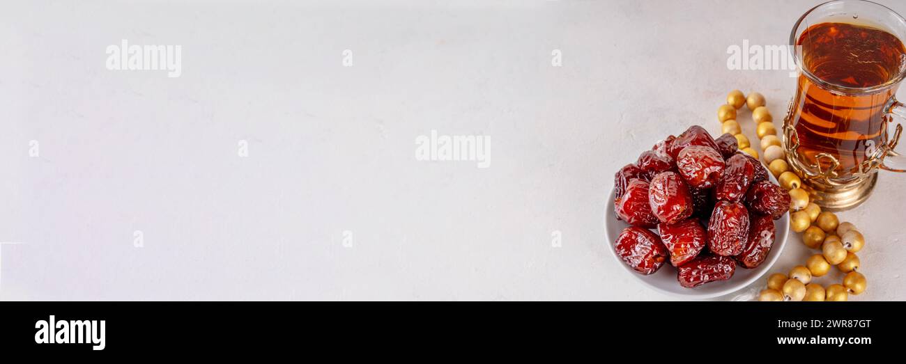 Ramadan Kareem background, Dates fruit, tea and rosary beads. Flat lay ...