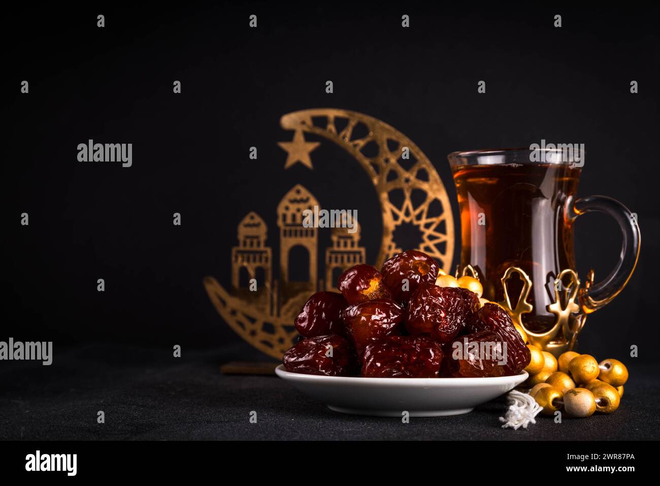 Ramadan Kareem background, Dates fruit, tea and rosary beads. Flat lay ...