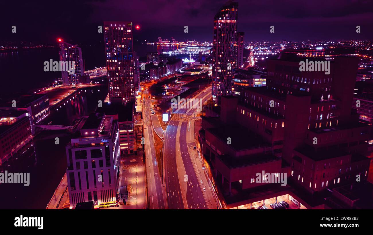 Aerial night view of a vibrant cityscape with illuminated streets and ...