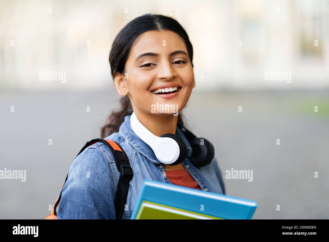 Portrait of arab young woman student posing outdoors Stock Photo