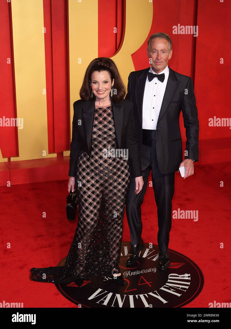 Fran Drescher and Peter Marc Jacobson attend the 2024 Vanity Fair Oscar Party Hosted By Radhika