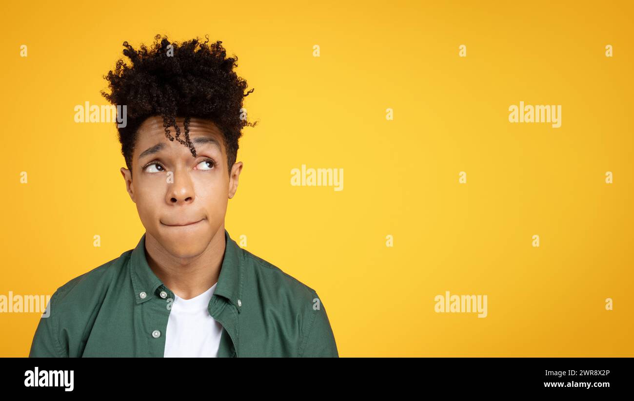 Confused young african hipster man hi-res stock photography and images ...