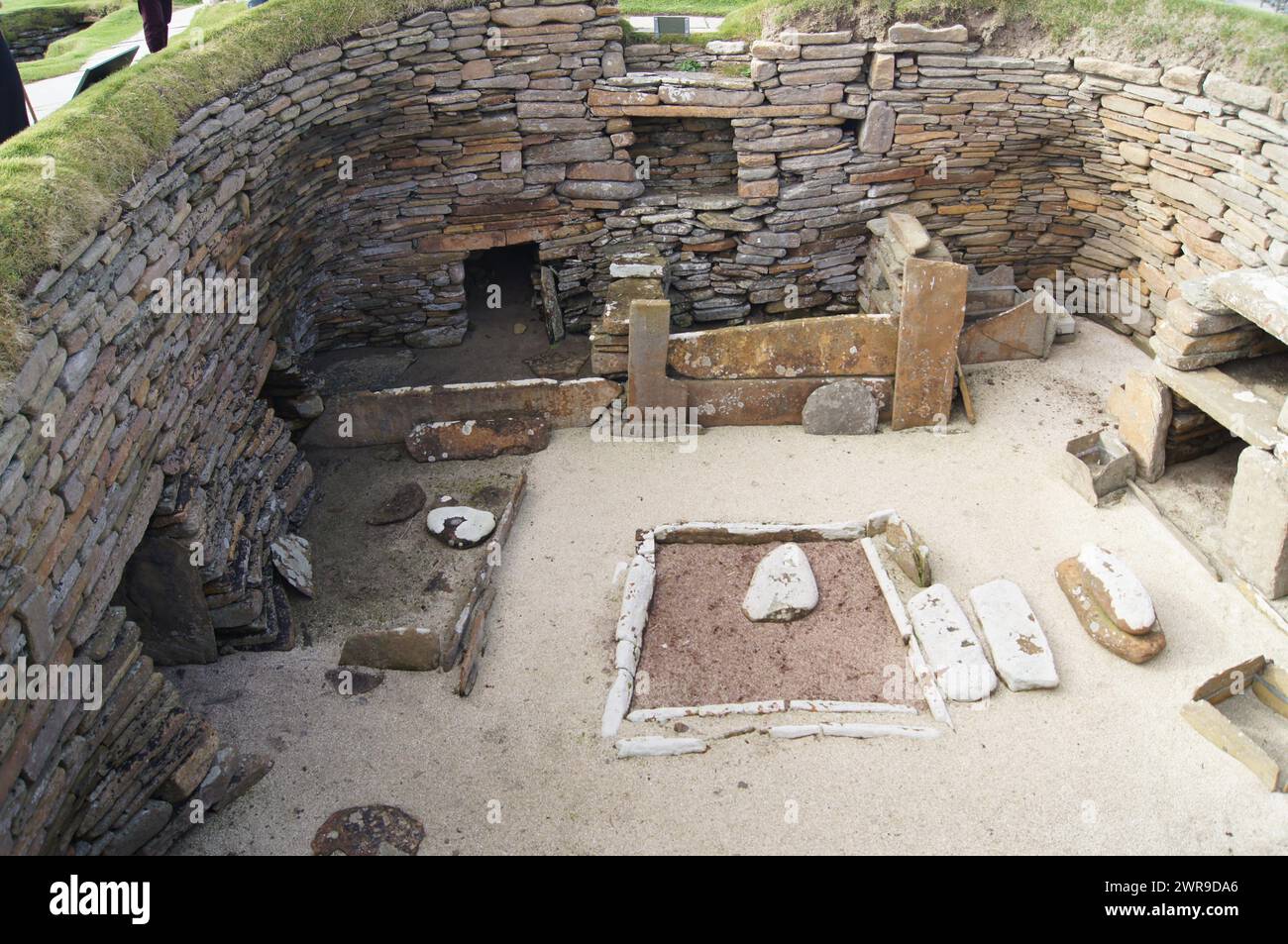 5000 year old Skara Brae stone-built Neolithic settlement, located on the Bay of Skaill, Orkney, Scotland Stock Photo