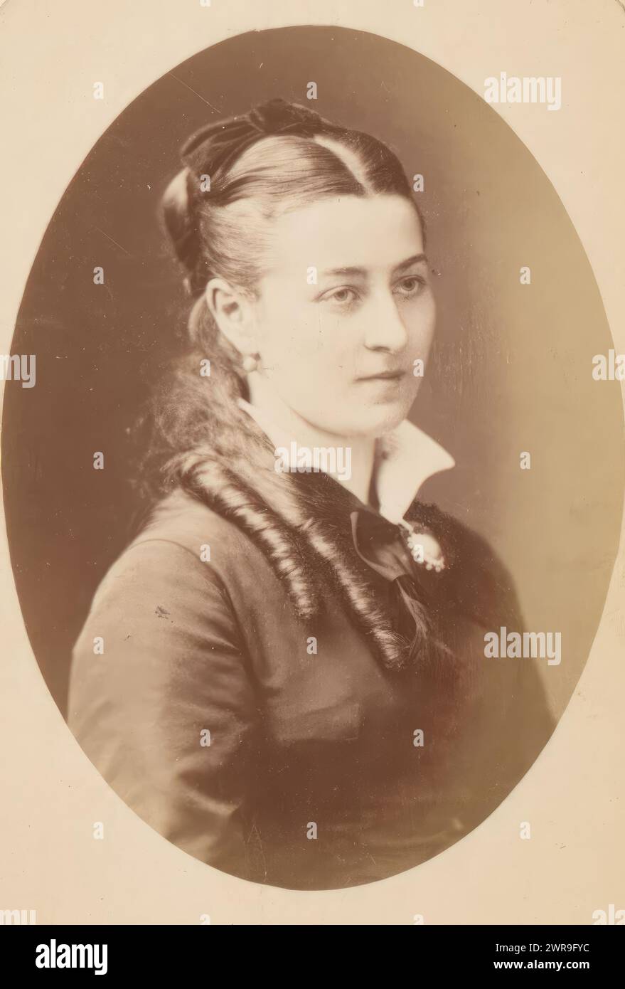 Portrait of a young woman with ringlets, This photo is part of an album., Walter Damry, Brussels, c. 1879, cardboard, albumen print, height 82 mm × width 52 mm, photograph Stock Photo