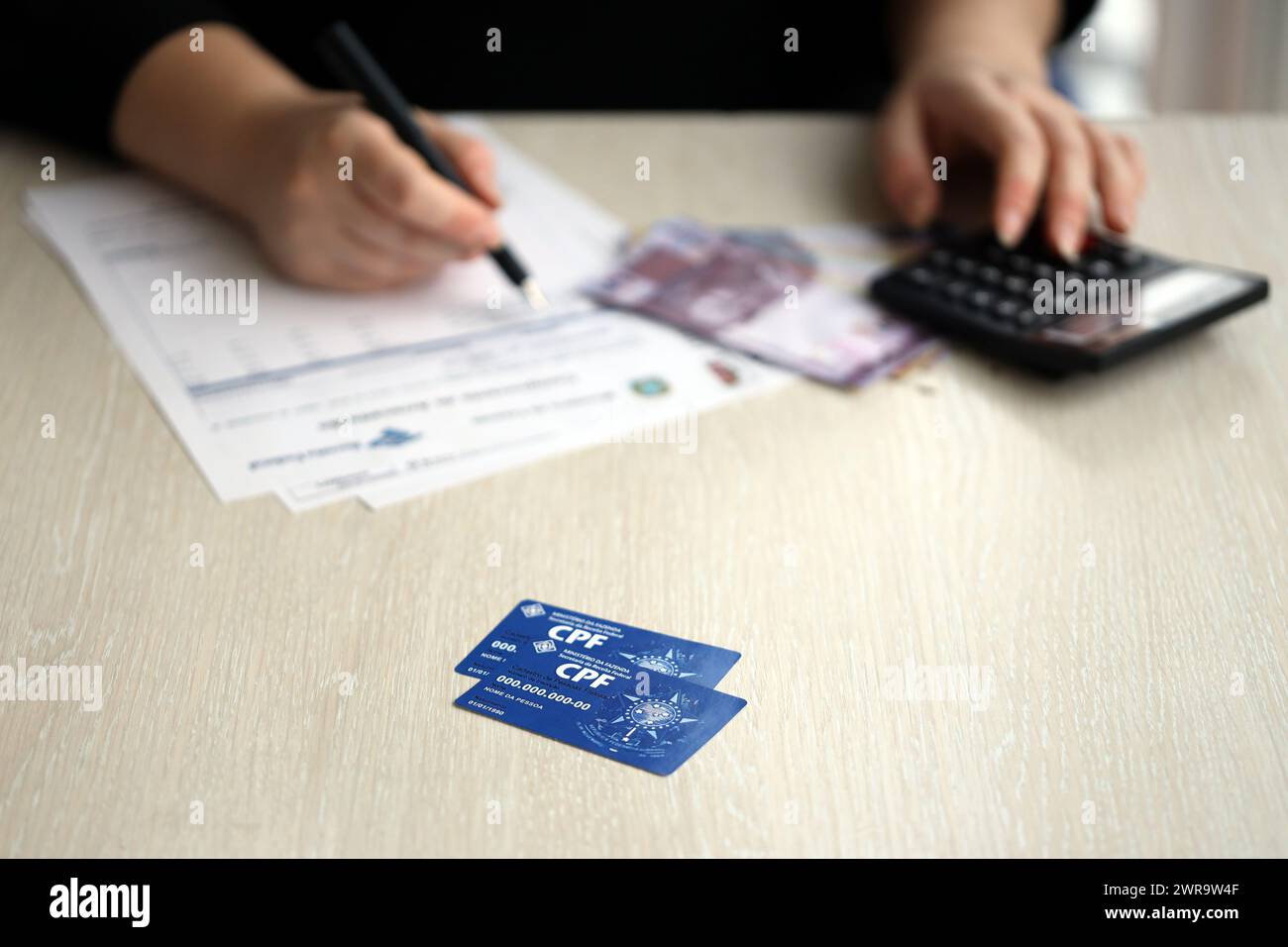 KYIV, UKRAINE - OCTOBER 31, 2023 Blue CPF card document template. The document guarantees authenticity and integrity in electronic communication between people in Brazil. Cadastro de Pessoa Fisica Stock Photo