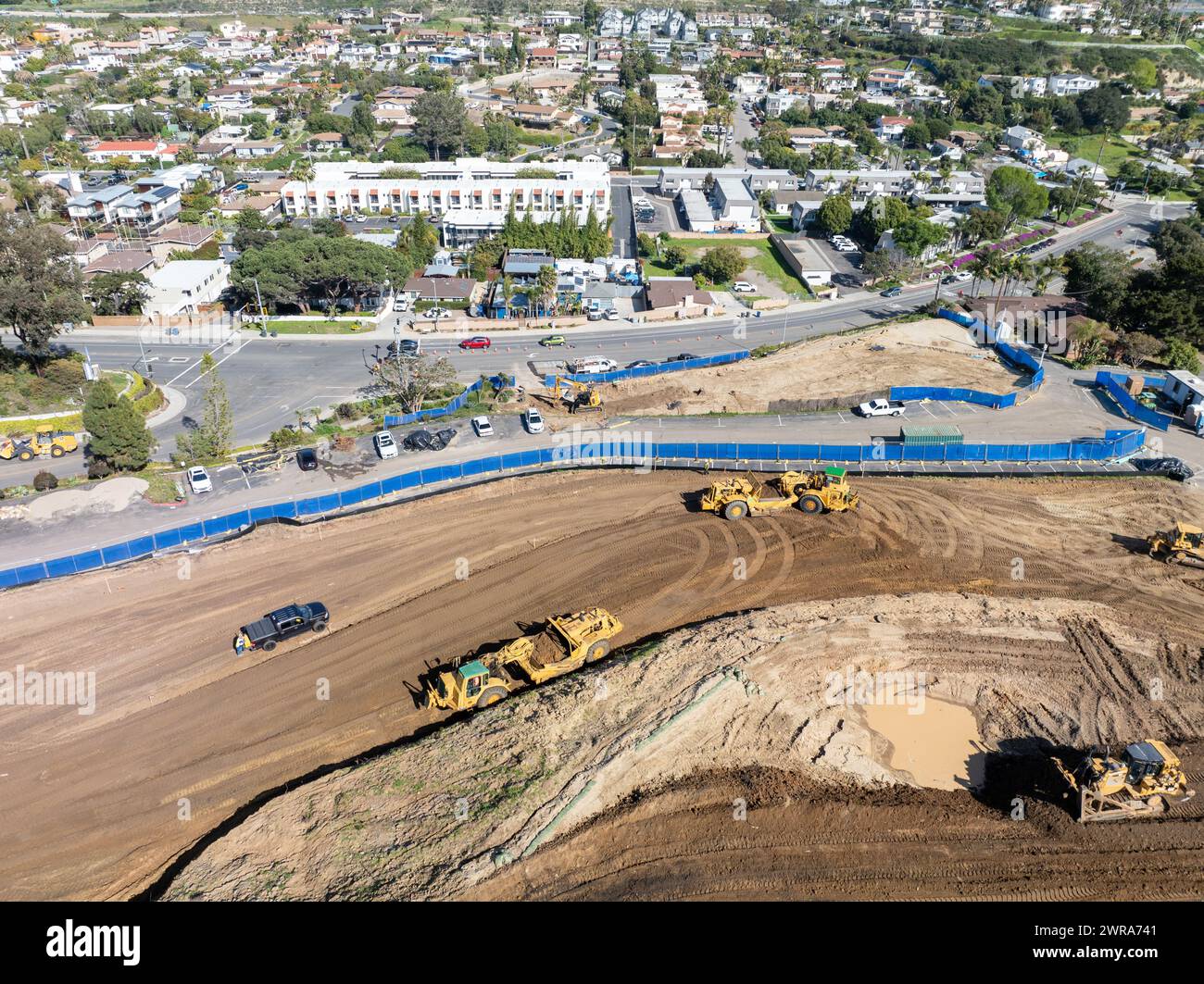 Aerial view of heavy construction equipment working at the construction