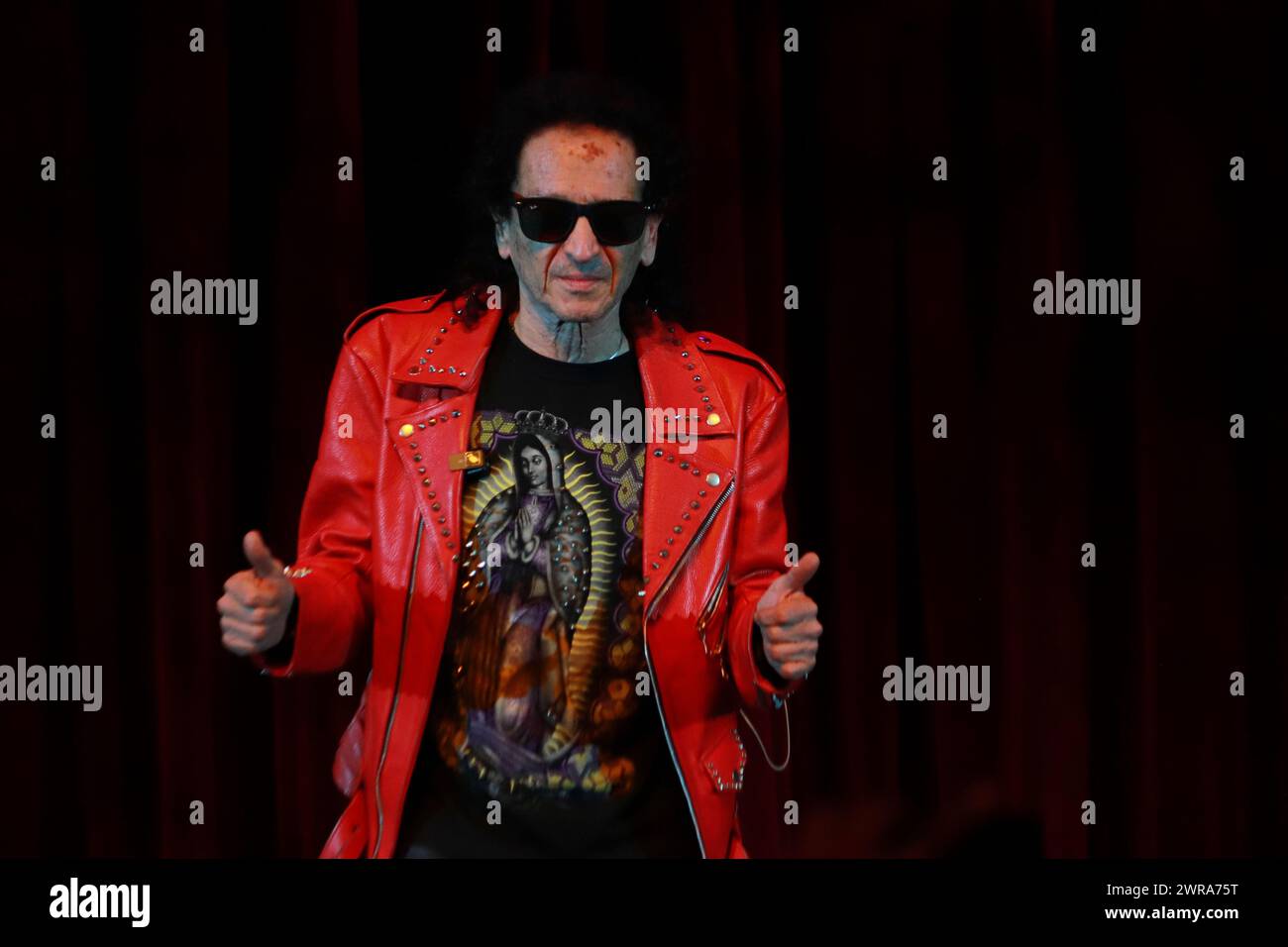 Mexican singer Alex Lora, of the band El Tri performs at the half